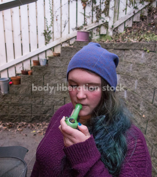 A young caucasian woman smokes legal marijuana in Washington state - Body Liberation Photos