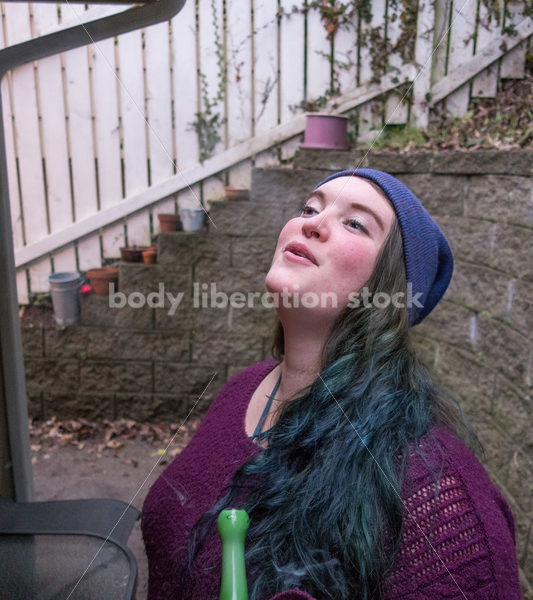 A young caucasian woman smokes legal marijuana in Washington state - Body Liberation Photos