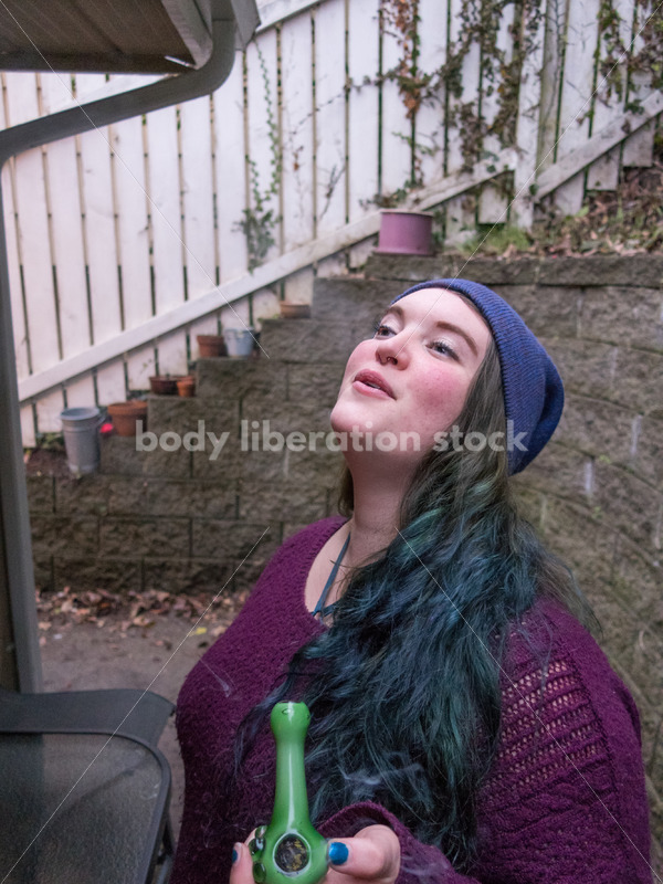 A young caucasian woman smokes legal marijuana in Washington state - Body Liberation Photos