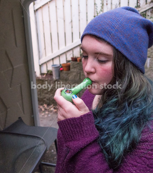 A young caucasian woman smokes legal marijuana in Washington state - Body Liberation Photos