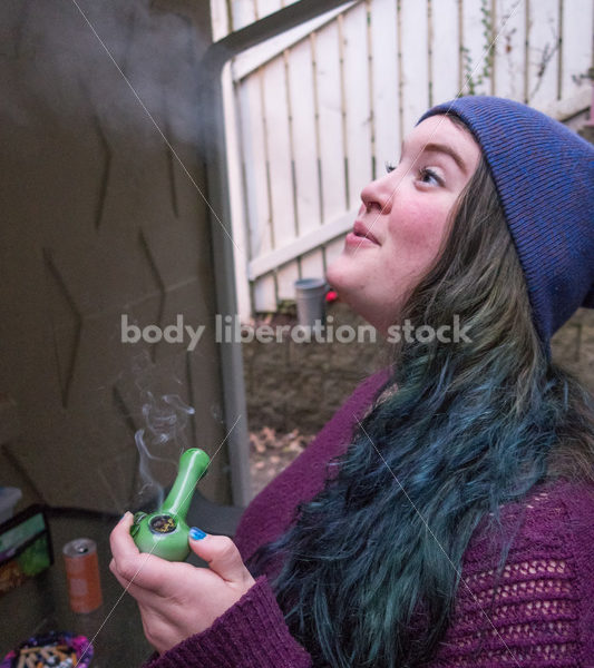 A young caucasian woman smokes legal marijuana in Washington state - Body Liberation Photos