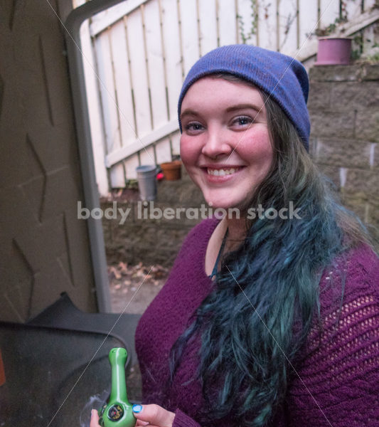 A young caucasian woman smokes legal marijuana in Washington state - Body Liberation Photos