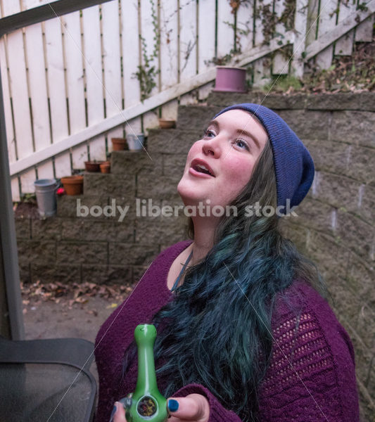 A young caucasian woman smokes legal marijuana in Washington state - Body Liberation Photos