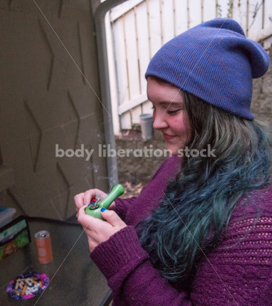 A young caucasian woman smokes legal marijuana in Washington state - Body Liberation Photos