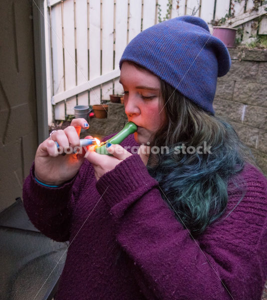 A young caucasian woman smokes legal marijuana in Washington state - Body Liberation Photos