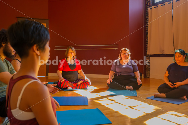 Diverse Mindfulness Stock Photo: Meditation During Yoga Class - Body positive stock and client photography + more | Seattle