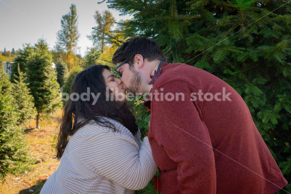 Holiday Stock Image: Plus-Size Couple at a Tree Farm - Body Liberation Photos