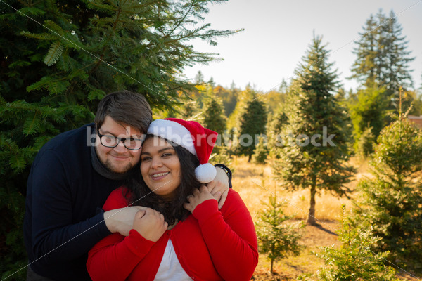 Holiday Stock Image: Plus-Size Couple at a Tree Farm - Body Liberation Photos