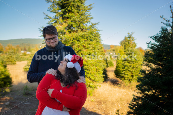 Holiday Stock Image: Plus-Size Couple at a Tree Farm - Body Liberation Photos