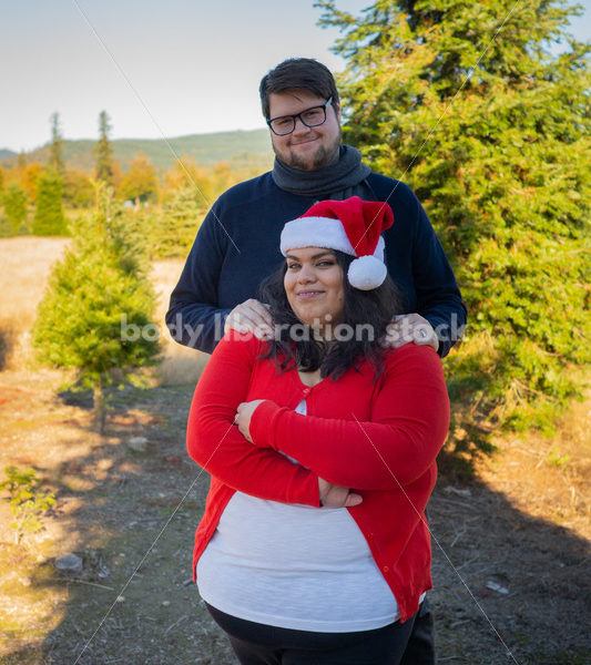 Holiday Stock Image: Plus-Size Couple at a Tree Farm - Body Liberation Photos