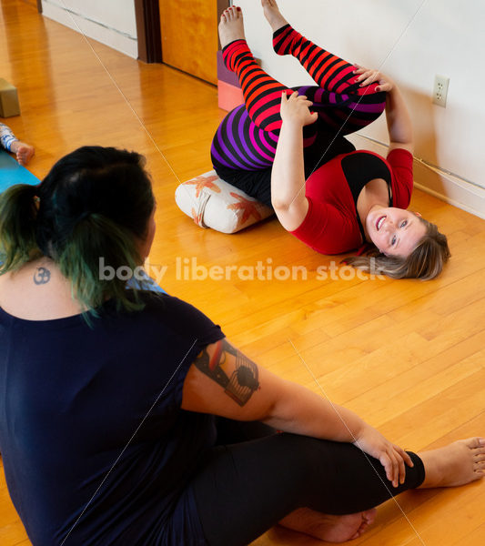 Inclusive Yoga Stock Photo: Yoga Instructor Interacting with Class - Body positive stock and client photography + more | Seattle