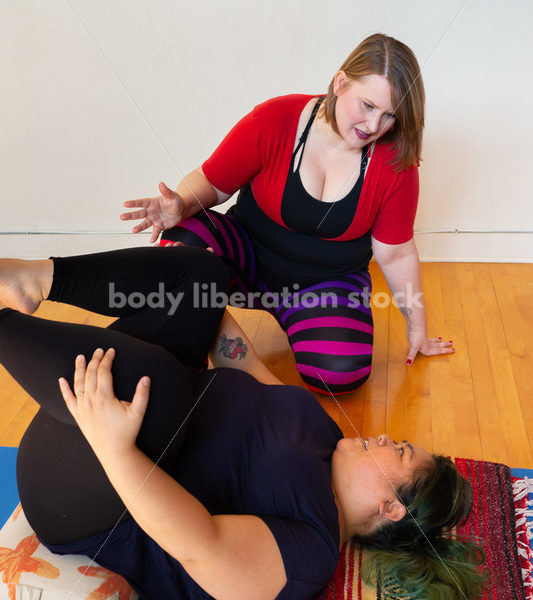 Inclusive Yoga Stock Photo: Yoga Instructor Interacting with Class - Body positive stock and client photography + more | Seattle