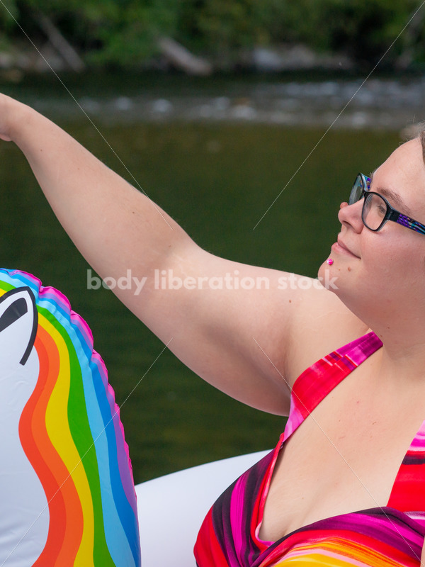 Plus-Size Lifestyle Stock Photo: Woman with Unicorn Float - Body Liberation Photos