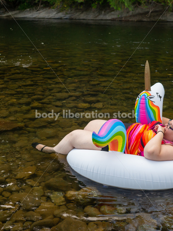 Plus-Size Lifestyle Stock Photo: Woman with Unicorn Float - Body Liberation Photos