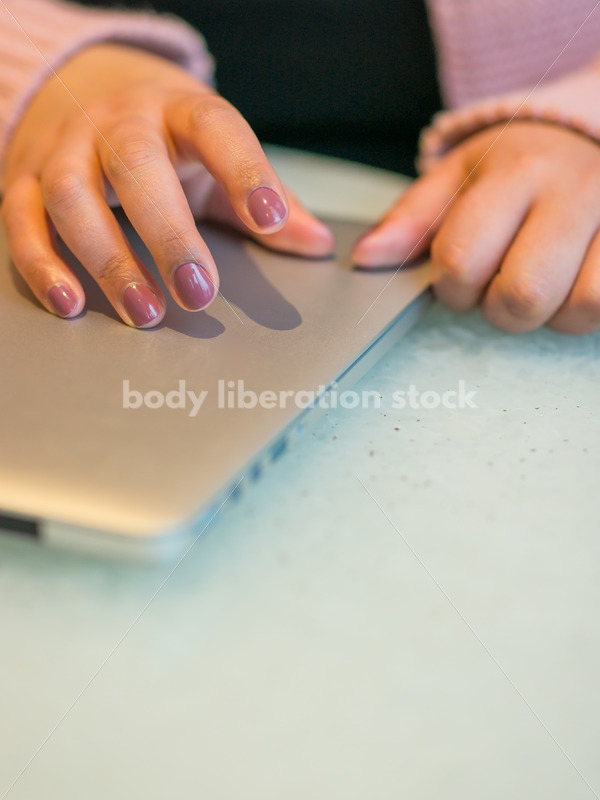 Royalty-Free Business Image: Black LGBT Woman Using Laptop Computer - Body Liberation Photos