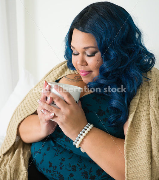 Royalty Free Stock Photo: Plus Size African American Woman Drinks Coffee on Bed - Body Liberation Photos & Stock