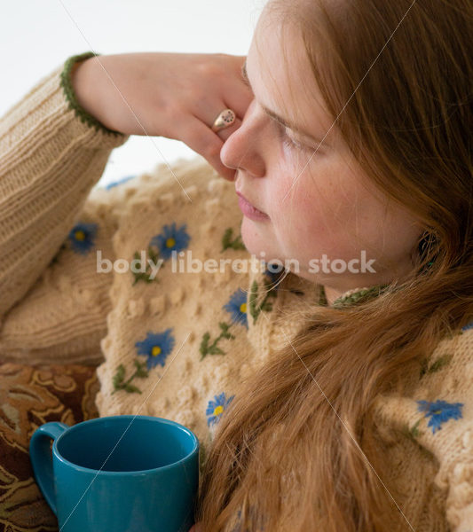 Self Care Stock Photo: Plus-Size Woman on Couch - Body Liberation Photos