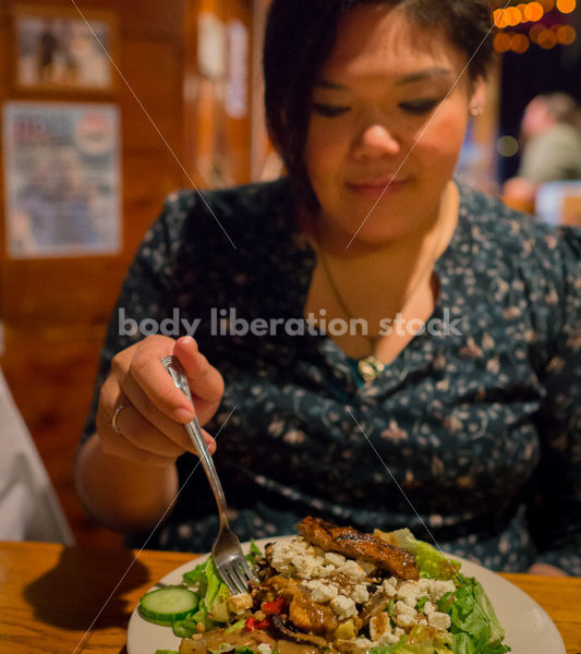 Stock Photo: Intuitive Eating – Asian American Woman with Food - Body Liberation Photos