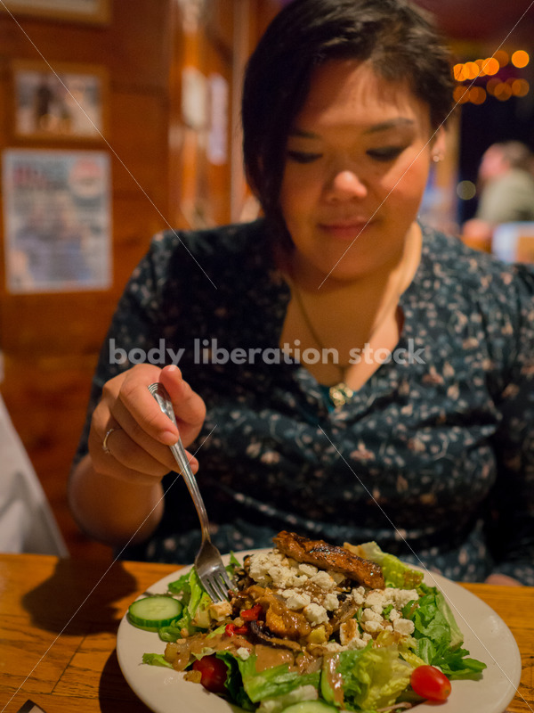 Stock Photo: Intuitive Eating – Asian American Woman with Food - Body Liberation Photos