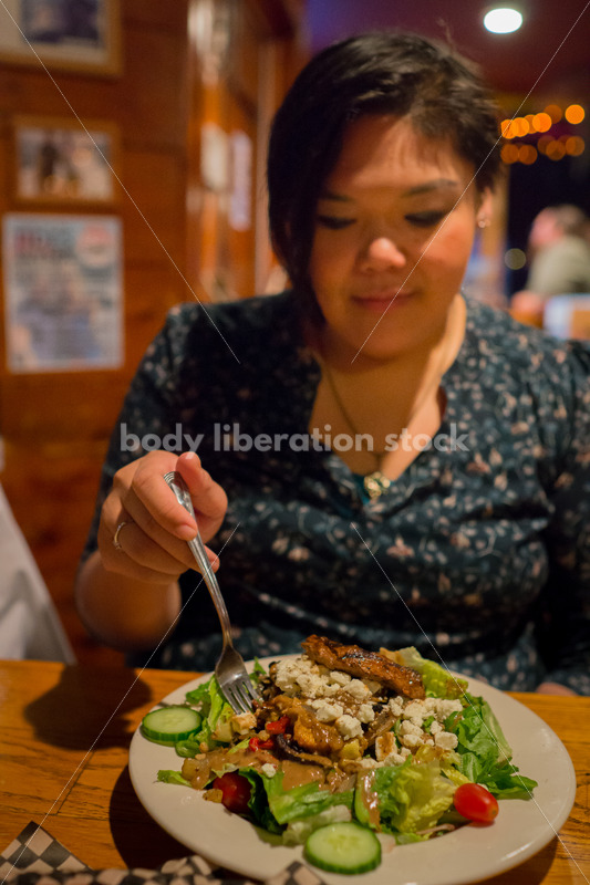 Stock Photo: Intuitive Eating – Asian American Woman with Food - Body Liberation Photos