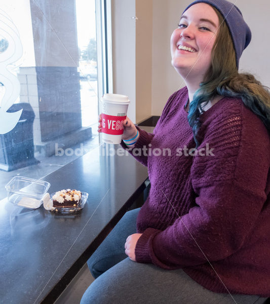 Young caucasian women enjoys coffee and a brownie - Body Liberation Photos