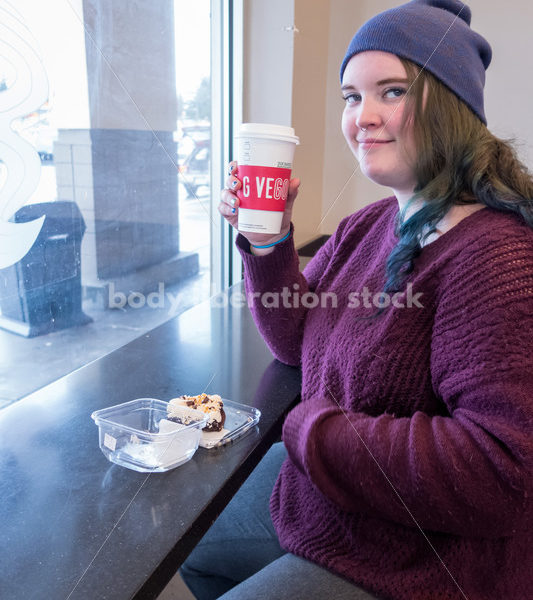 Young caucasian women enjoys coffee and a brownie - Body Liberation Photos