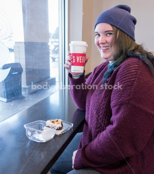 Young caucasian women enjoys coffee and a brownie - Body Liberation Photos