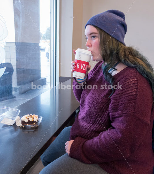 Young caucasian women enjoys coffee and a brownie - Body Liberation Photos