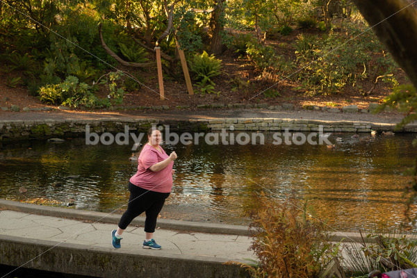 Fat Athlete Stock Photo: Walking & Running Outdoors - Body Liberation Photos & Stock