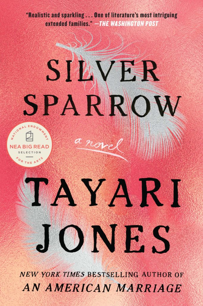 Image description: Pink and orange background with light grey feathers. Black text on top reads "Silver Sparrow a novel Tayari Jones."