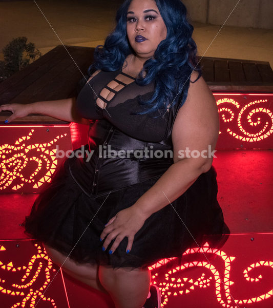 Multiracial Woman In Seattle’s International District, On Red Steps - Body Liberation Photos & Stock