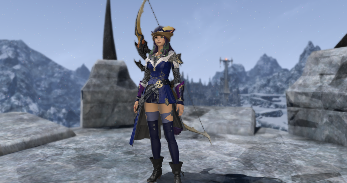 A thin, female video game character in a short skirt, carrying a bow and standing on an icy stone platform in the mountains.