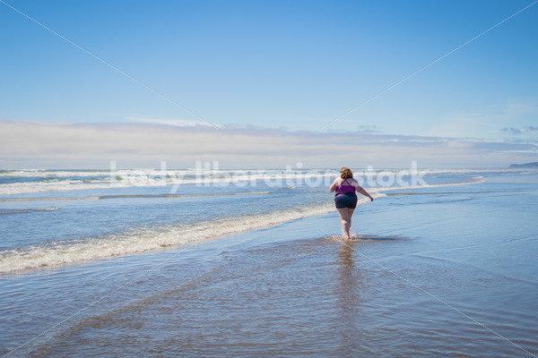 Body-Positive Stock Photo: Fat Woman on Beach - Body Liberation Photos