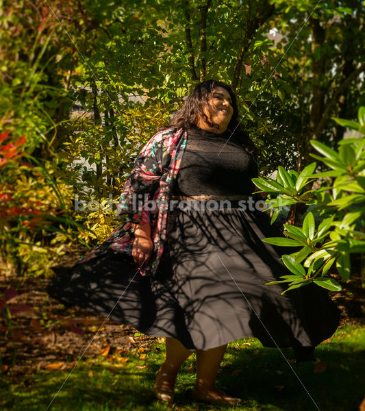 Inclusive Stock Photo: Plus-Size Woman Dances in Garden - Body liberation boudoir, portraits, stock, HAES & more | Seattle