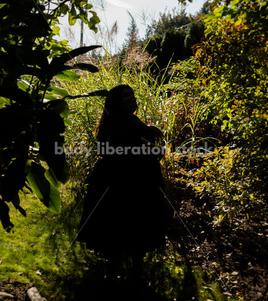 Inclusive Stock Photo: Plus-Size Woman Dances in Garden - Body liberation boudoir, portraits, stock, HAES & more | Seattle