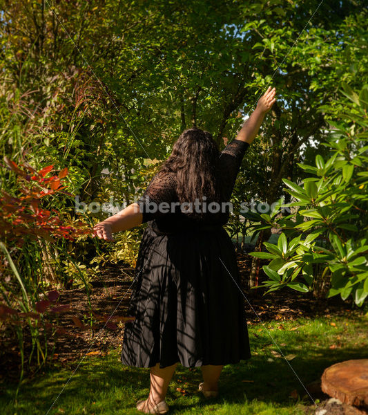 Inclusive Stock Photo: Plus-Size Woman Dances in Garden - Body liberation boudoir, portraits, stock, HAES & more | Seattle