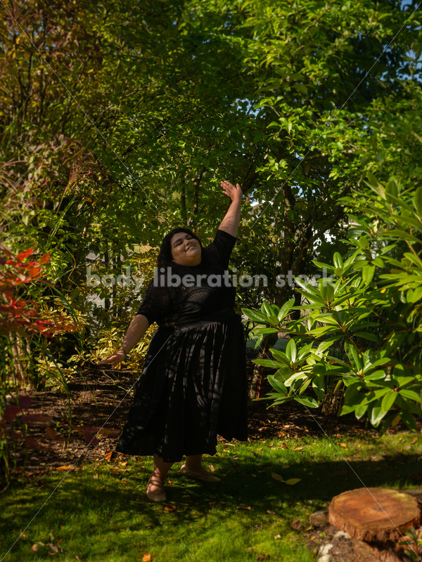 Inclusive Stock Photo: Plus-Size Woman Dances in Garden - Body liberation boudoir, portraits, stock, HAES & more | Seattle