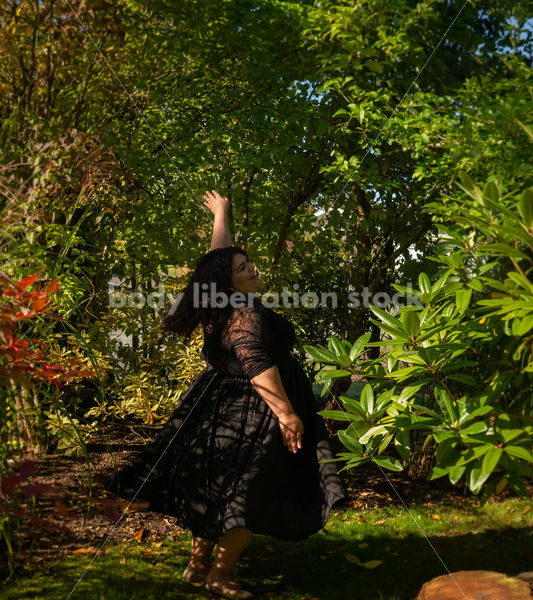 Inclusive Stock Photo: Plus-Size Woman Dances in Garden - Body liberation boudoir, portraits, stock, HAES & more | Seattle