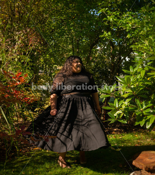 Inclusive Stock Photo: Plus-Size Woman Dances in Garden - Body liberation boudoir, portraits, stock, HAES & more | Seattle