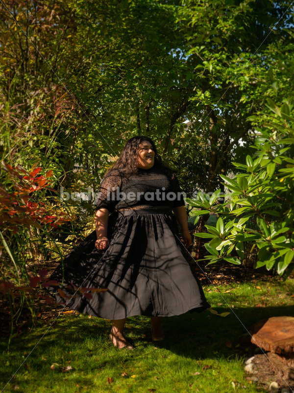 Inclusive Stock Photo: Plus-Size Woman Dances in Garden - Body liberation boudoir, portraits, stock, HAES & more | Seattle