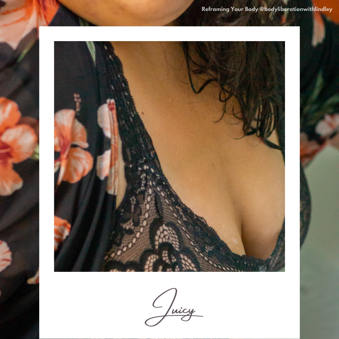 A woman of color's bust area, clothed in a floral jacket and black lace bra. A faux polaroid frame is on top with today's word written on the frame.