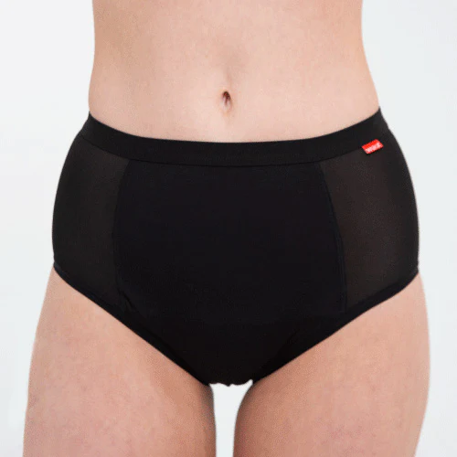 A thin white person wearing black panties