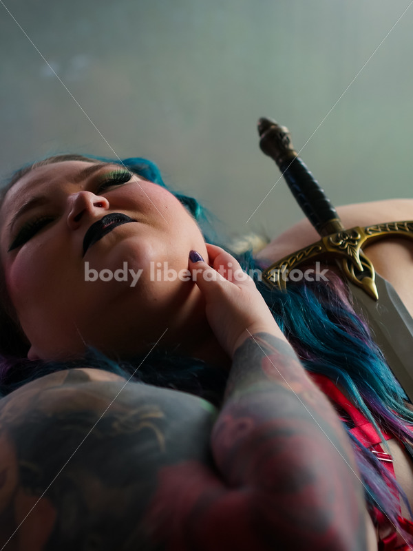 Body Liberation Stock Photo: A Plus Size Woman in Lingerie with a Sword - It's time you were seen ⟡ Body Liberation Photos
