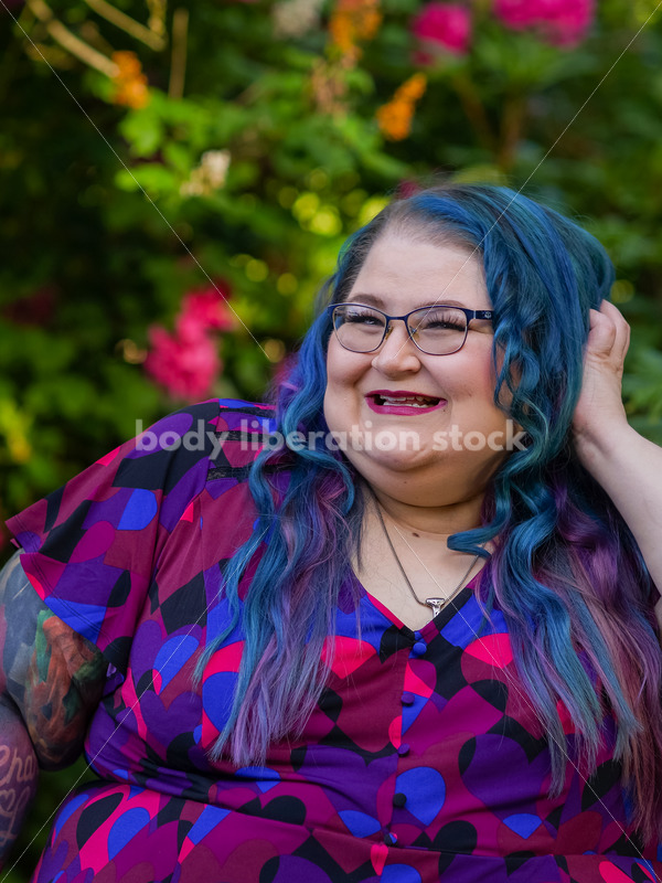 Body Liberation Stock Photo: A Plus Size Woman with Colorful Hair Poses Flirtatiously - It's time you were seen ⟡ Body Liberation Photos