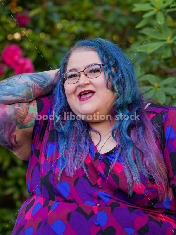 Body Liberation Stock Photo: A Plus Size Woman with Colorful Hair with a Bashful Expression - It's time you were seen ⟡ Body Liberation Photos