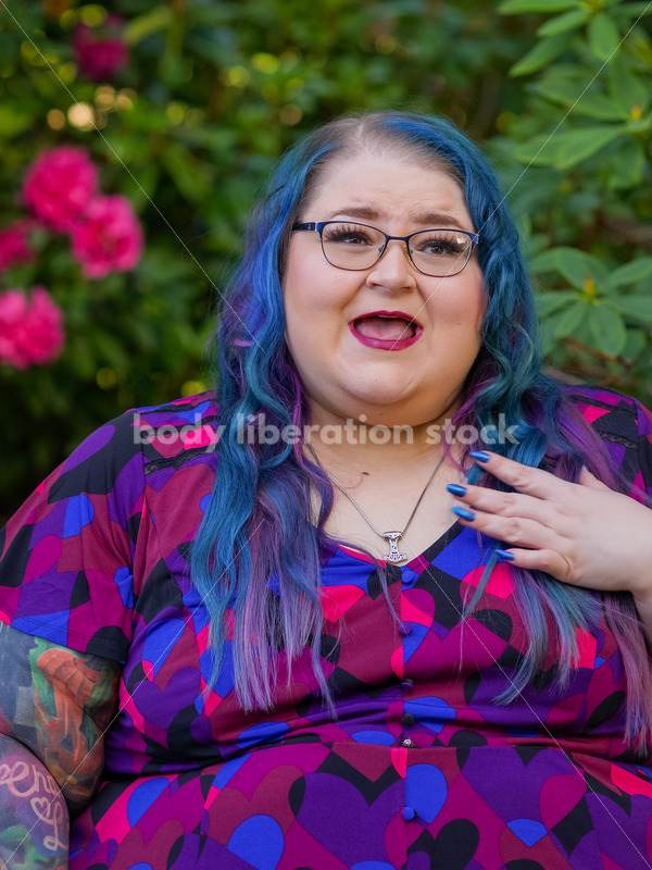 Body Liberation Stock Photo: A Plus Size Woman with Colorful Hair with a Passionate Expression - It's time you were seen ⟡ Body Liberation Photos