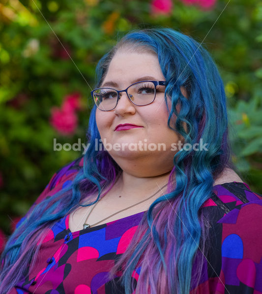 Body Liberation Stock Photo: A Plus Size Woman with Colorful Hair with a Pensive Expression - It's time you were seen ⟡ Body Liberation Photos