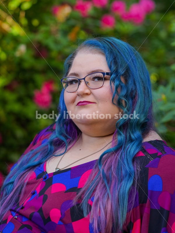 Body Liberation Stock Photo: A Plus Size Woman with Colorful Hair with a Pensive Expression - It's time you were seen ⟡ Body Liberation Photos
