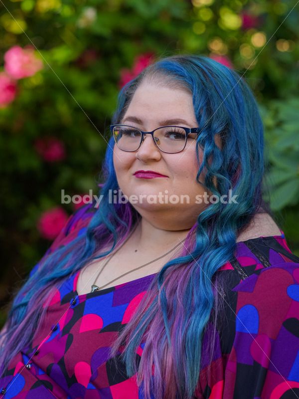 Body Liberation Stock Photo: A Plus Size Woman with Colorful Hair with a Withering Expression - It's time you were seen ⟡ Body Liberation Photos