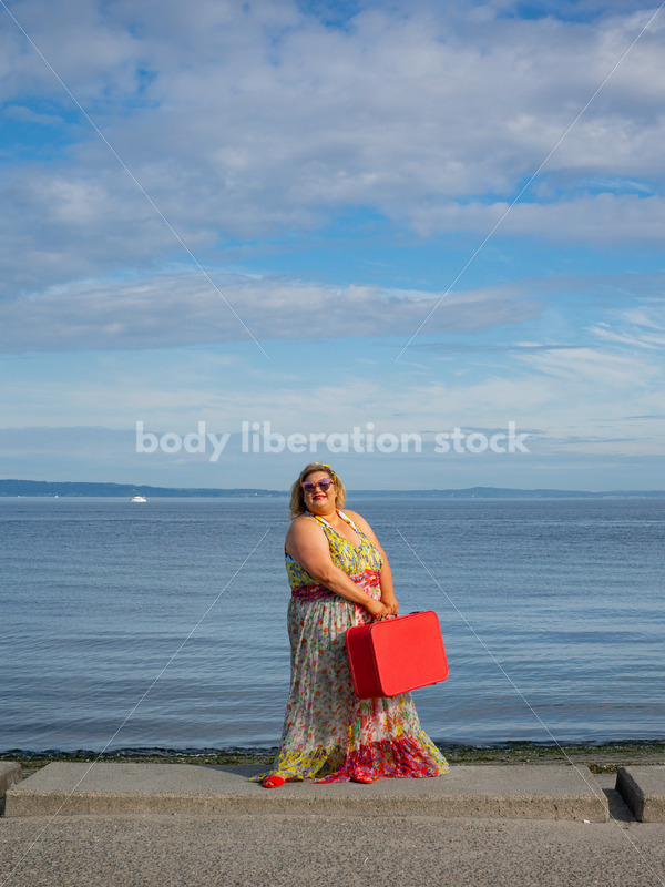 Body-Positive Stock Photo: Plus Size Woman Gripping a Suitcase on the Beach - It's time you were seen ⟡ Body Liberation Photos